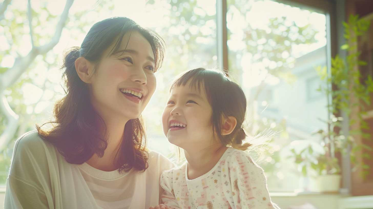 リラックスして笑顔で向き合う親子の姿（新札幌の小児矯正・相談）